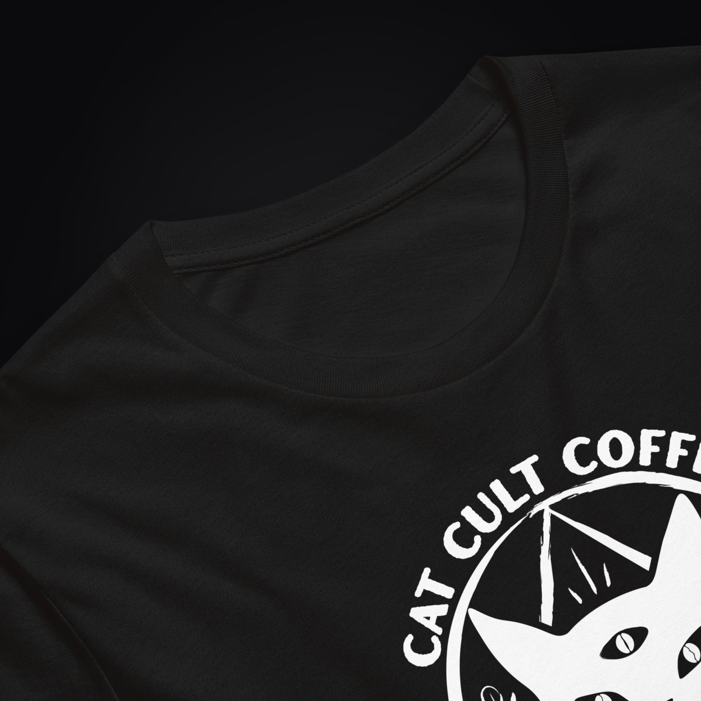Close-up of black lightweight cotton fabric and printed Classic Mark design.